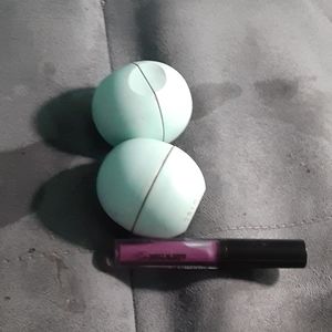 Two eos and a lip gloss